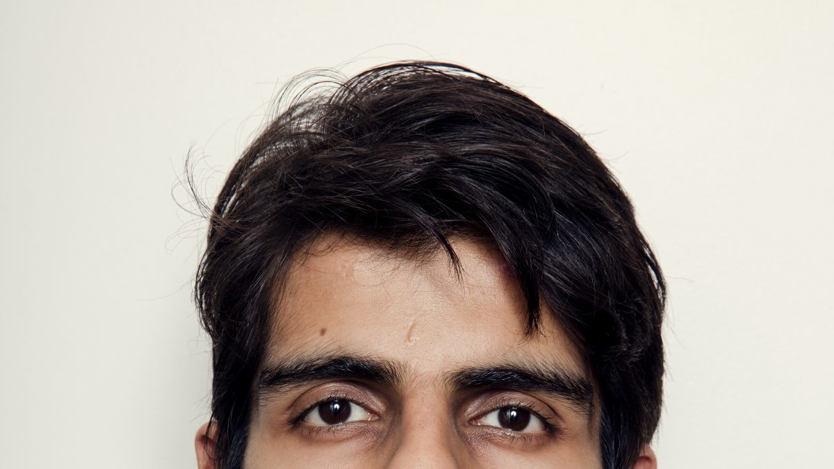 Headshot of Ainesh Madan