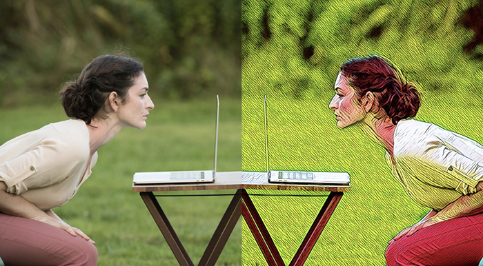 Image Description: Dancer - Nicole Daniell. This image shows one dancer in a white top and pink pants leaning forward and gazing into a laptop in profile against outdoor greenery. Reflected on the other side is a mirror image of the dancer looking back at herself.